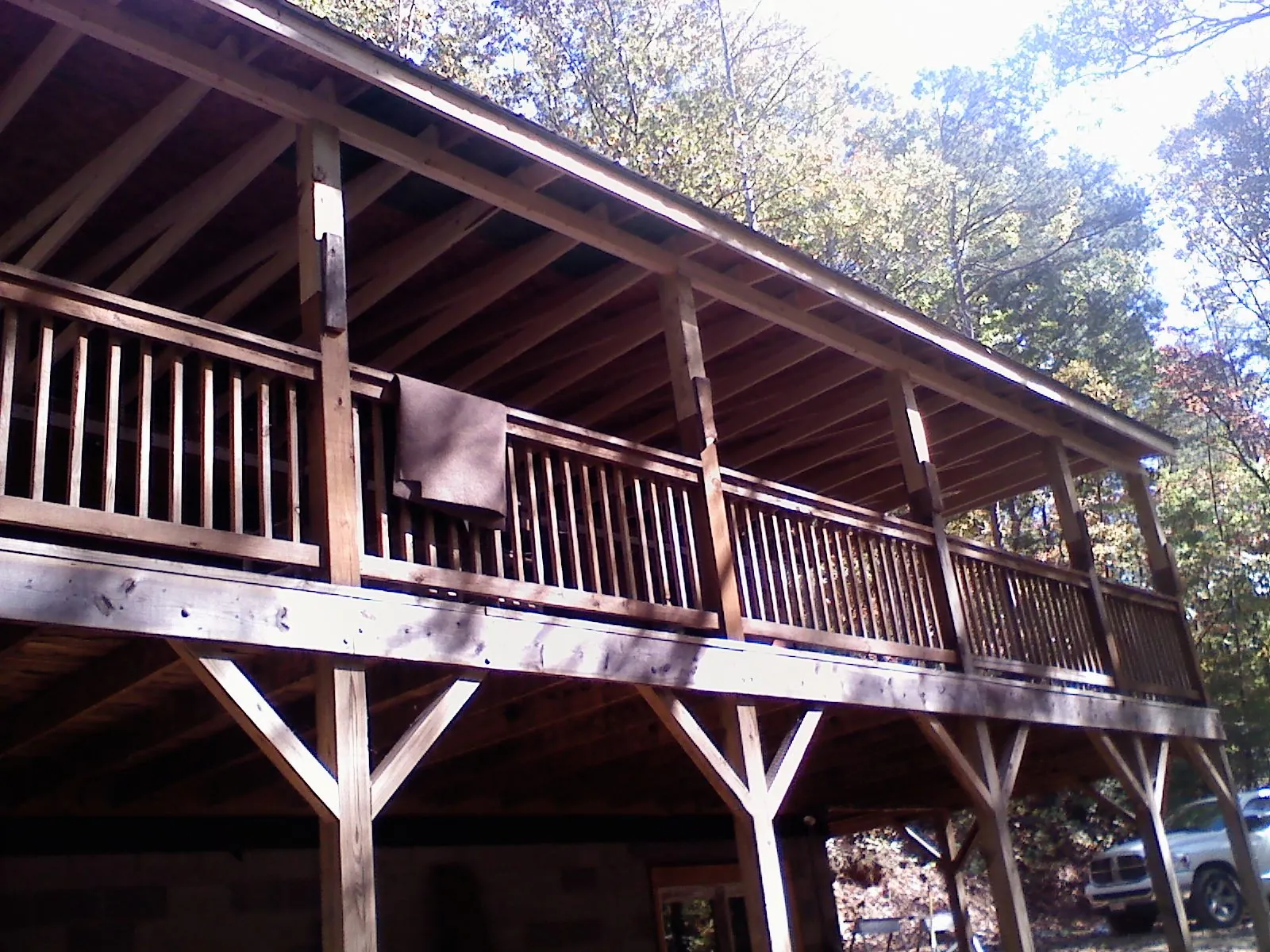 Timber framing under a new elevated porch and deck — Roof Leak Repair in Island Park by Roofing Brothers